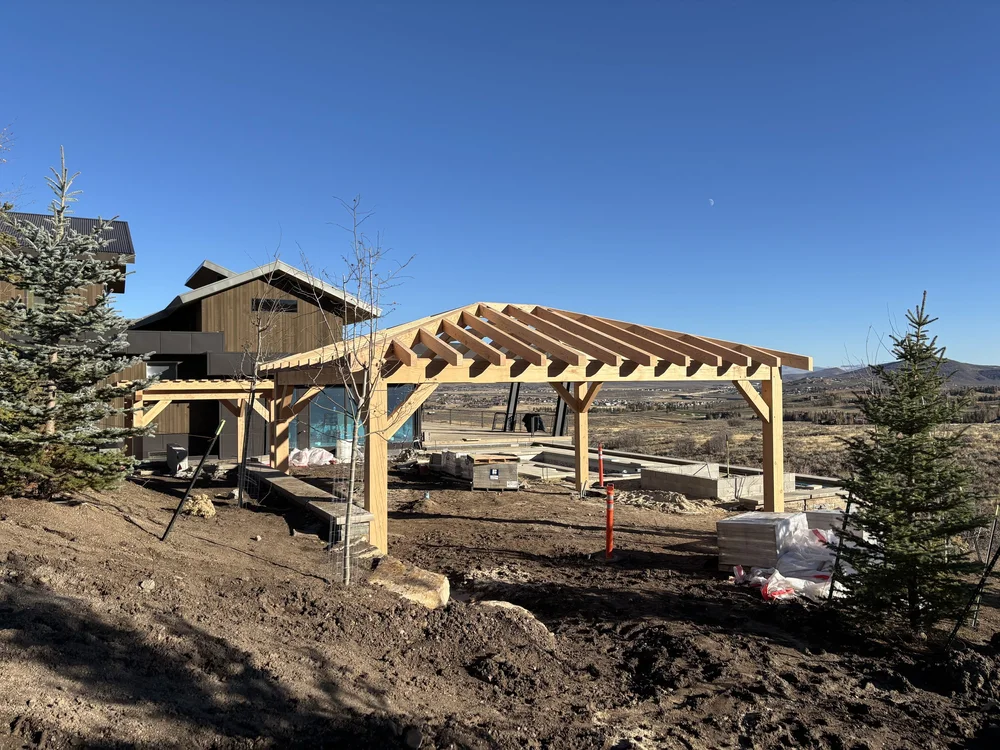 Two wooden pergolas built for an install