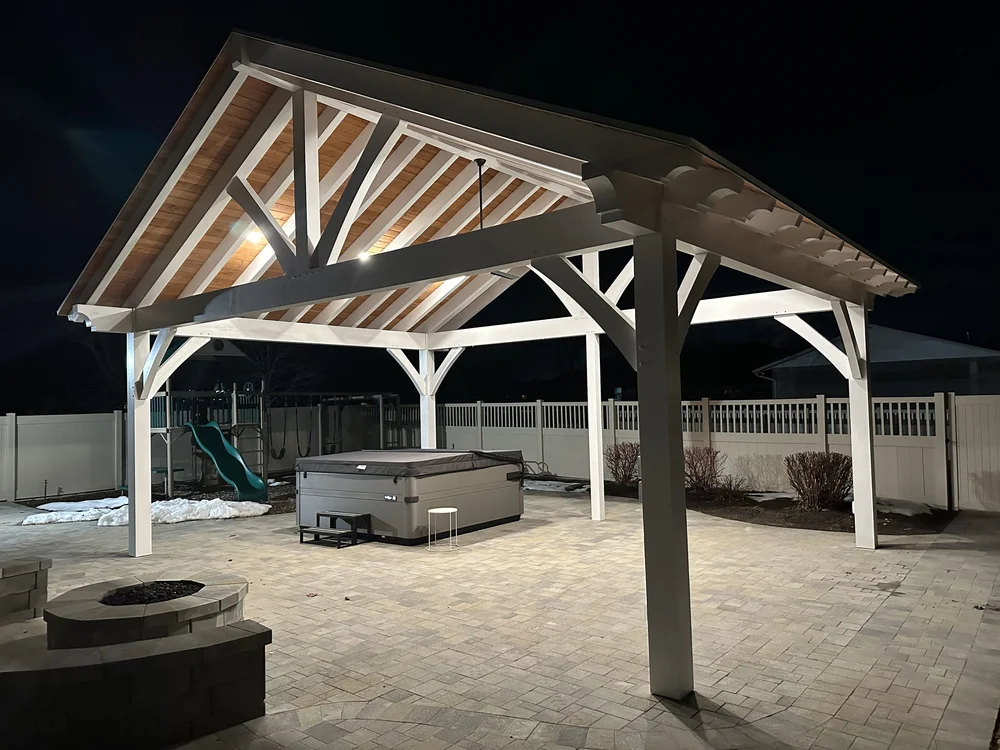 A backyard outdoor timber structure featuring our white timber beams and joinery