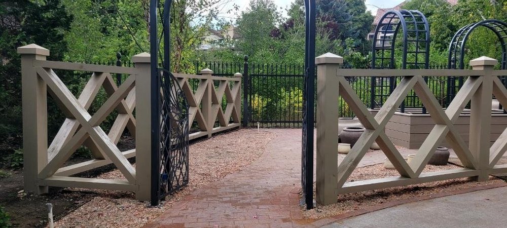 A park entrance with our timber fences and an arched trellis design