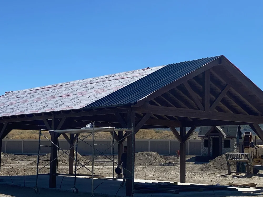 A timber pavilion being installed while onsite