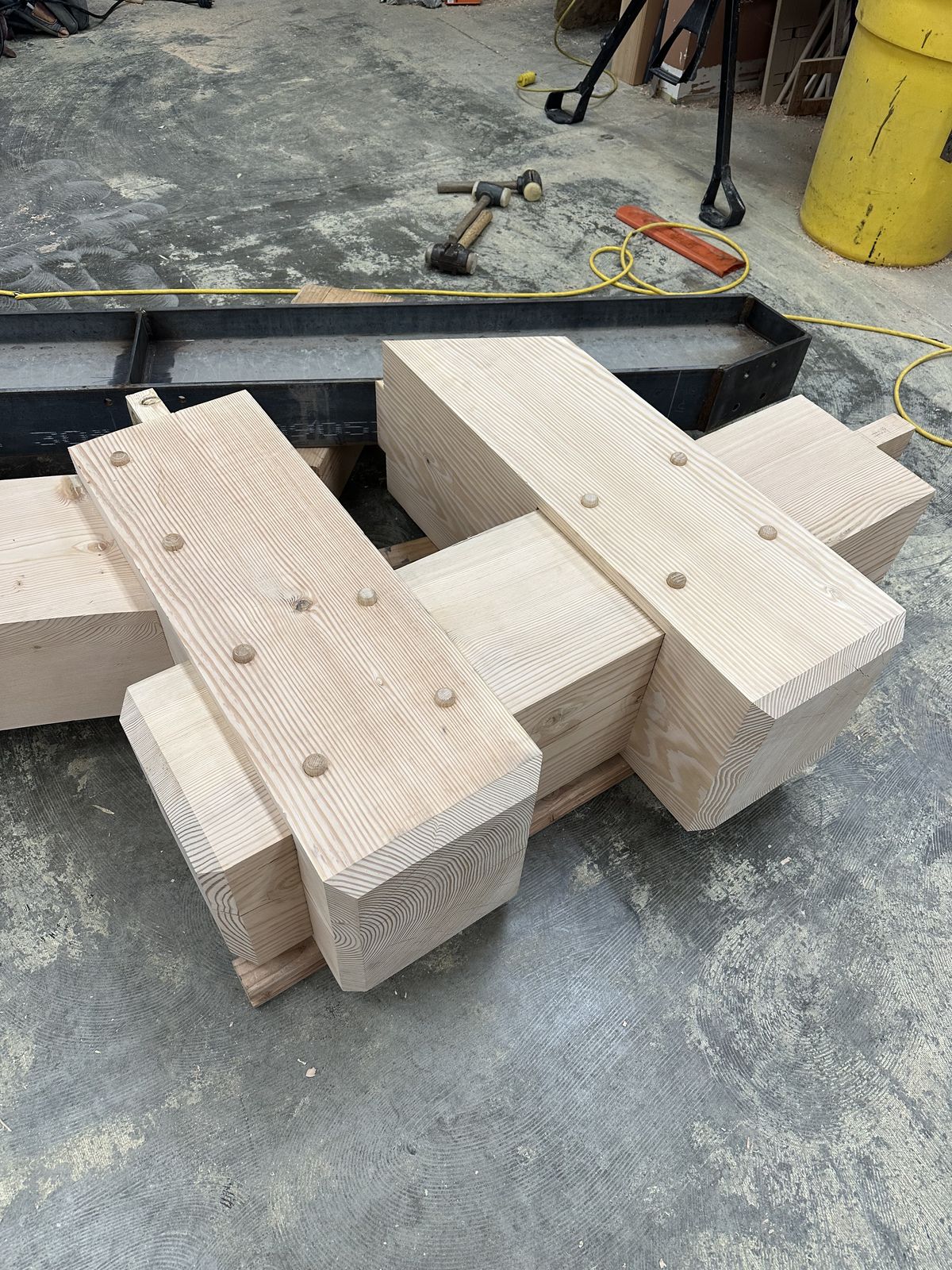 Timber post joinery with steel connector plates and dowels