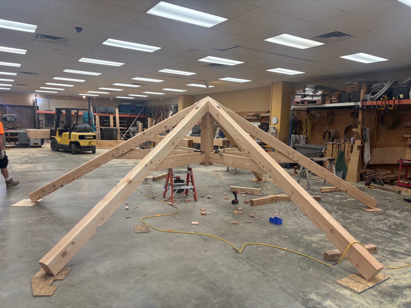 Heavy timber roof truss laid out and assembled on the shop floor