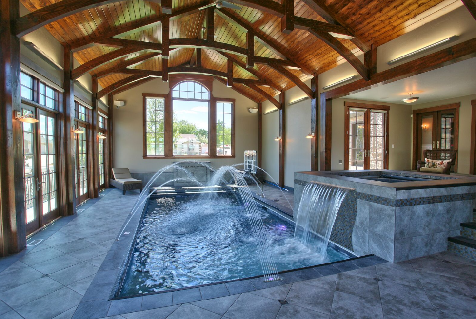 Indoor pool design with our wooden timber ceiling beams installed