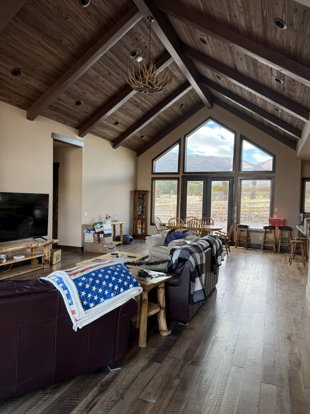 Living room with exposed indoor timber beams