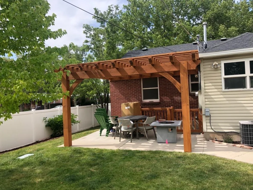 Custom backyard timber pergola installed over a patio